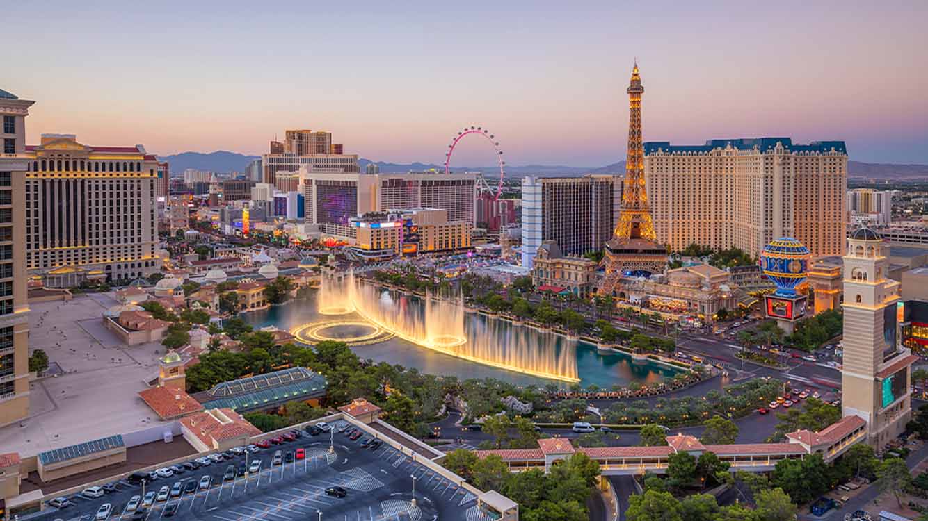 Las Vegas Strip at sunset with Bellagio fountains